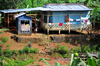 So Joo plantation / roa So Joo, Cau district, So Tom and Prcipe / STP: wooden house with a small hut used as a grocery shop / casa de madeira com uma pequena barraca usada como mercearia - photo by M.Torres