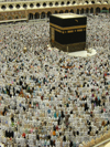 Mecca / Makkah, Saudi Arabia: Muslims get ready to pray at Haram Mosque, facing the Holy Kaaba during Hajj season - the first building at the site was built by Abraham - photo by A.Faizal