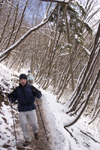 hiker on a frozen trail - Smarna Gora mountain on the outskirts of Ljubljana, Slovenia - photo by I.Middleton