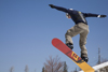 Slovenia - Snowboarder jumping on Vogel mountain in Bohinj - photo by I.Middleton