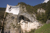 Predjama castle - flag, Slovenia - photo by I.Middleton