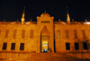 Istanbul, Turkey: Sultan-Ahmet mosque aka Blue mosque - north-west faade, by the Roman hippodrome - gate to the courtyard - nocturnal - Eminn district - photo by M.Torres