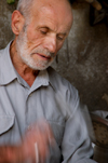 Mardin - Southeastern Anatolia, Turkey: artisan working the metal - photo by J.Wreford