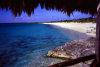 Providenciales - Turks and Caicos: basalt and sand - beach seen from a hut - photo by L.Bo