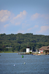 Mystic, CT, USA: Mystic River with its lighthouse,  Stonington side, the East bank - Mystic Seaport - photo by M.Torres