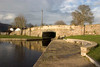 Llangollen, Denbighshire / Sir Ddinbych, Wales, UK: stone bridge over an entrance to the Llangollen Branch of the Shropshire Union Canal - aka Llangollen Canal - photo by I.Middleton