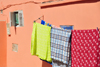 Layoune / El Aaiun, Saguia el-Hamra, Western Sahara: blankets in the sun - Colonial district - photo by M.Torres