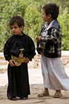 Wadi Dhahr, Al-Mahwit Governorate, Yemen: young boys with Jambiyya daggers - photo by J.Pemberton