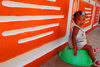 Praia, Santiago island / Ilha de Santiago - Cape Verde / Cabo Verde: small girl on a green bowl - photo by E.Petitalot