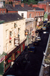 Stockport, Greater Manchester, England: animated clock above Winter's pub - Little Underbank street - photo by Miguel Torres