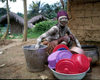 Grand Basa County: secret society girl - doing the dishes (photographer: Mona Sturges)