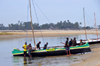 Morondava - Menabe, Toliara province, Madagascar: fishermen bring their boats to shore - Nosy Kely peninsula - photo by M.Torres