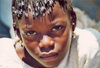 Segou: girl with plaited hair - at the market (photo by Nacho Cabana)