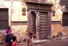 Ilha de Moambique / Mozambique island: gate with carved decoration - stone built town / porto decorado - cidade de pedra - photo by F.Rigaud