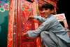 Peshawar, NWFP, Pakistan: boys painting in a truck workshop - photo by G.Koelman