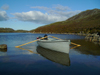 South Uist island / Uibhist a Deas, Outer Hebrides, Scotland: boat on Loch Snigisclett - photo by T.Trenchard