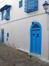 image of Tunisia - Sidi Bou Said: decorated blue gate / door (photo by J.Kaman)