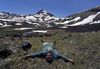 Rio Grande National Forest, Colorado, USA: hiker rests below the Rio Grande Pyramid peak - Colorado Rockies - photo by C.Lovell