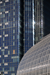 Oklahoma City, OK, USA: glass facades of Devon Tower and Crystal Bridge Tropical Conservatory, seen from Myriad Botanical Gardens - photo by M.Torres