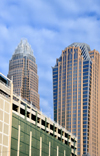 Charlotte, North Carolina, USA: Hearst Tower - North Tryon Street, to the left Bank of America tower and parking deck below - photo by M.Torres